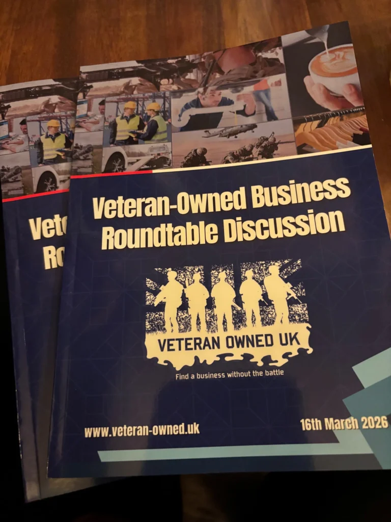 Poster for a Veteran-Owned UK business roundtable discussion; bold title and silhouettes of people in uniform image on blue background.